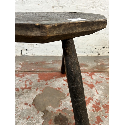 53 - A 19th century ebonized cutler’s stool - approx. 35cm high x 35cm wide x 23cm deep