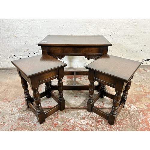 88A - A carved oak nest of tables