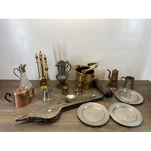 375 - A collection of antique and later metalware to include three 18th/19th century pewter dinner plates ... 