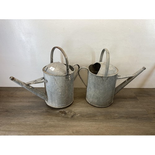 378 - Four vintage galvanized watering cans