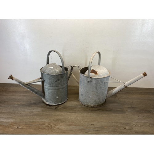 378 - Four vintage galvanized watering cans