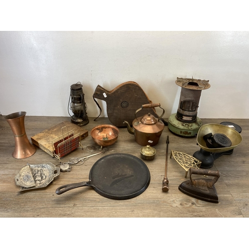 379 - A collection of metalware to include 19th century Salter flat iron, mid 20th century copper and bras... 