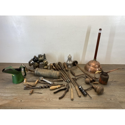 383 - A collection of metalware and vintage hand tools to include early 20th century brass Supreme fire ex... 