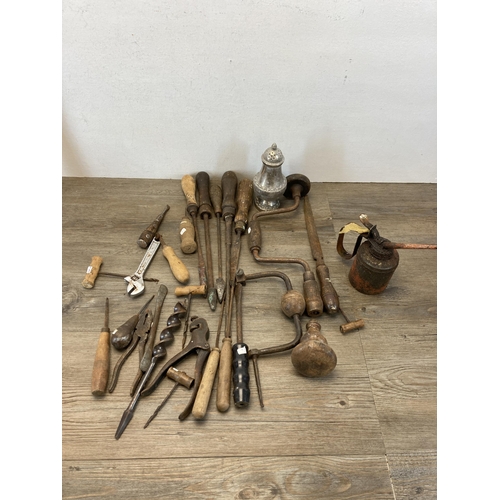 383 - A collection of metalware and vintage hand tools to include early 20th century brass Supreme fire ex... 