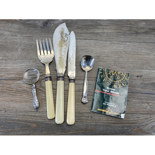 386 - A collection of antique and later cutlery to include six place fish knife and fork set, white metal ... 