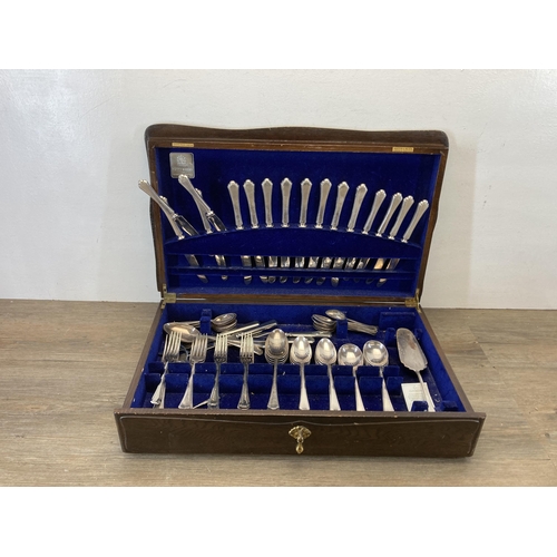 391 - An early/mid 20th century Mappin & Webb oak canteen of cutlery