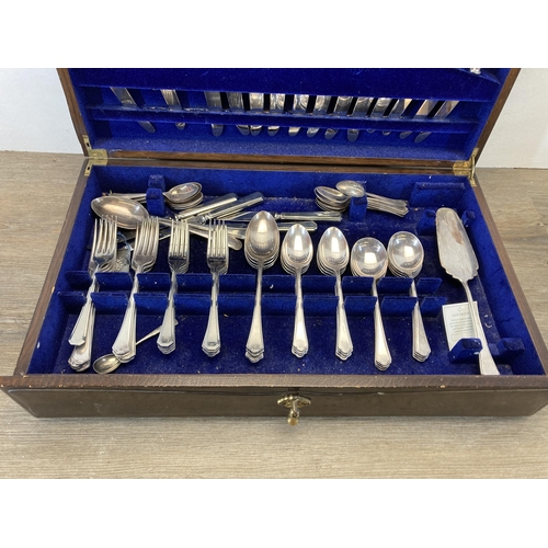 391 - An early/mid 20th century Mappin & Webb oak canteen of cutlery