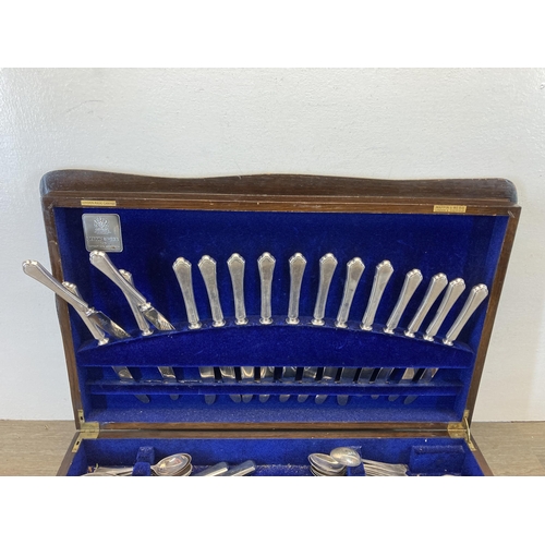 391 - An early/mid 20th century Mappin & Webb oak canteen of cutlery