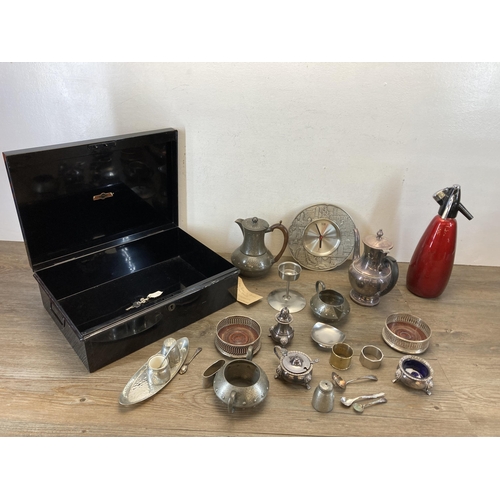 393 - A collection of metalware to include early 20th century black metal deed box, A.M & Co. hand beaten ... 