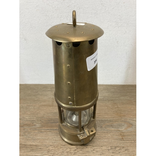 394 - A Protector Lamp & Lighting Co. Ltd. Type 6 M & Q brass miners safety lamp