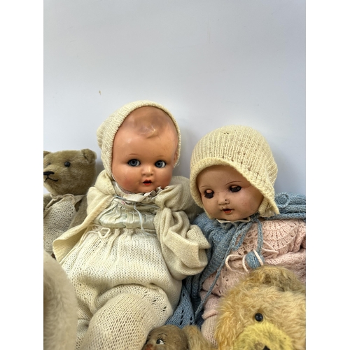 395 - A collection of vintage soft toys and dolls to include Armand Marseille plastic headed doll etc.