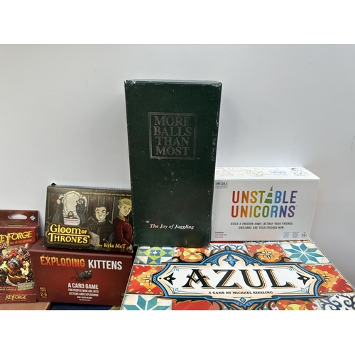 398 - A collection of board games to include Scrabble, Sushi Go Party!, Unstable Unicorns etc.