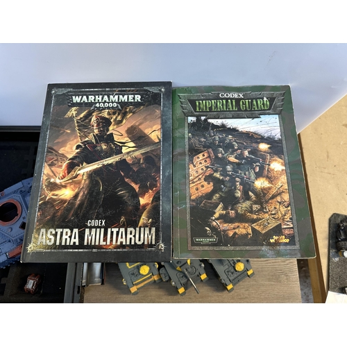 404 - A collection of Warhammer model making kits and accessories to include Astra Militarum Leman Russ Ba... 