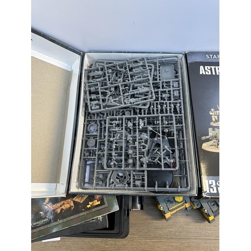 404 - A collection of Warhammer model making kits and accessories to include Astra Militarum Leman Russ Ba... 