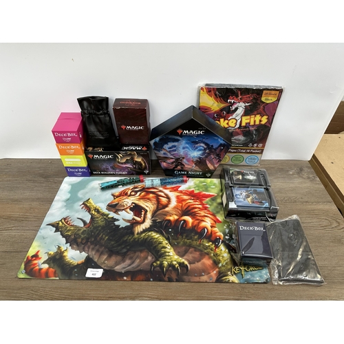 422 - A collection of Magic The Gathering trading cards and accessories to include deck builders tool kit,... 