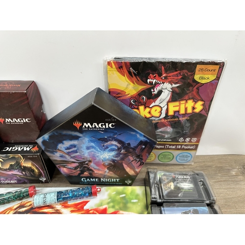 422 - A collection of Magic The Gathering trading cards and accessories to include deck builders tool kit,... 