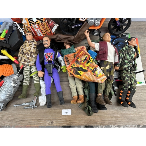 424 - A collection of Action Man figurines and accessories