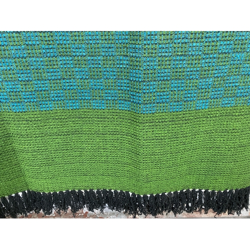 464 - A mid 20th century green and blue hand woven bed throw