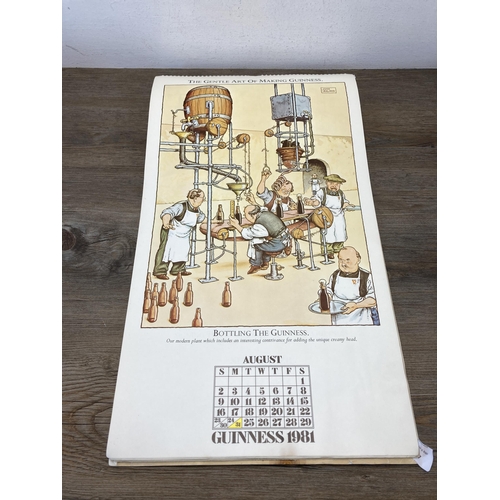 467 - Four vintage Guinness advertising calendars and one Pentax calendar