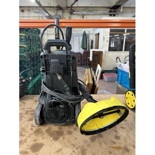 763 - A Karcher K4 240v pressure washer with attachments