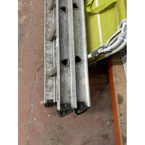 770 - A set of aluminium extending ladders