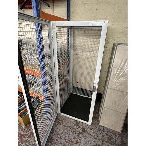 772 - A white metal meshed cage with latch - approx. 153cm high x 61cm wide x 68cm deep