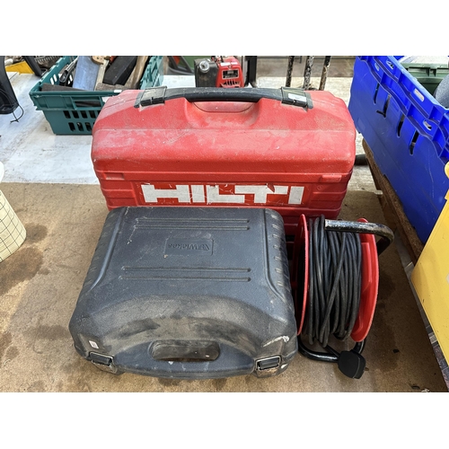 785 - Three items, one Wickes 850w belt sander, one 30 metre 13 amp extension reel and one cased Hilti WSC... 