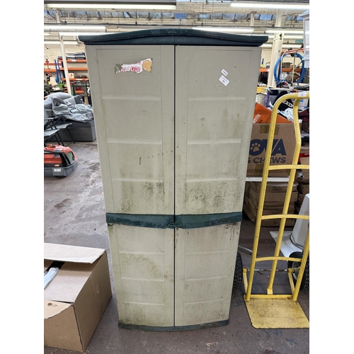 791 - A plastic two door garden storage cabinet - approx. 153cm high x 68cm wide x 47cm deep