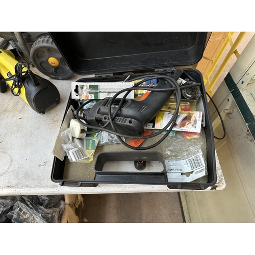 792 - A box containing tools and accessories to include Black & Decker BD561 400w hammer drill, cased dril... 