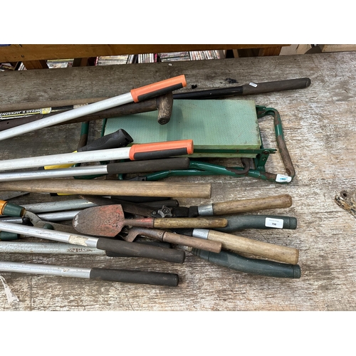 798 - A collection of gardening hand tools