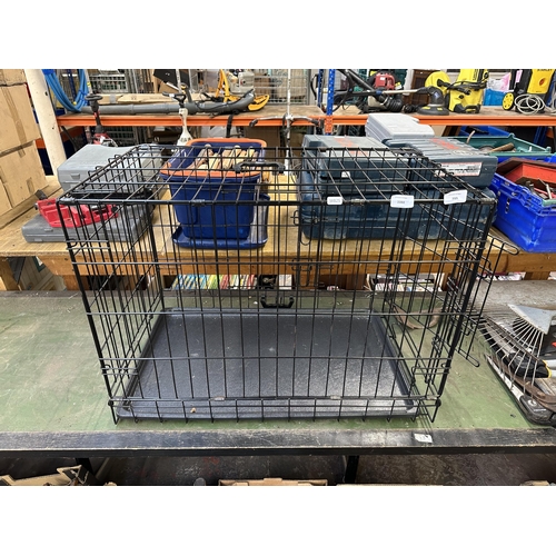 799 - A metal dog cage - approx. 55cm high x 48cm wide x 76cm deep