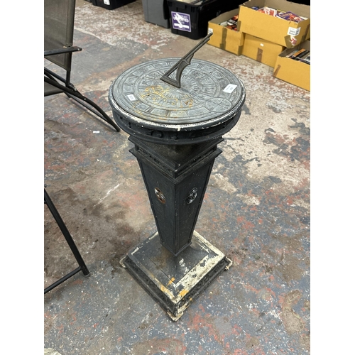 802 - A cast metal sun dial on pedestal base - approx. 94cm high x 32cm diameter