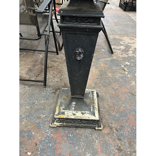 802 - A cast metal sun dial on pedestal base - approx. 94cm high x 32cm diameter