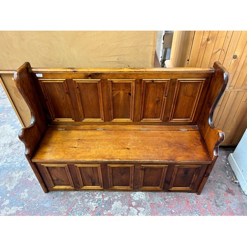 75E - A 19th century style pine monk's bench - approx. 91cm high x 122cm wide x 39cm deep