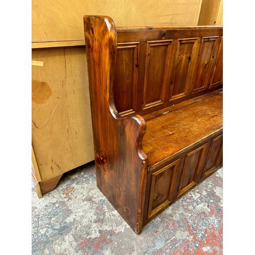 75E - A 19th century style pine monk's bench - approx. 91cm high x 122cm wide x 39cm deep