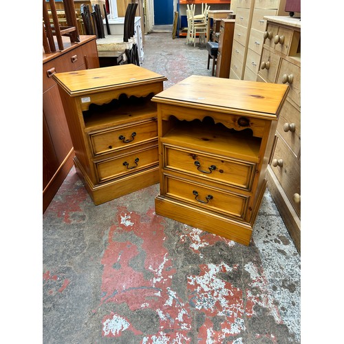 85 - A pair of modern pine two drawer bedside cabinets - approx. 68cm high x 48cm wide x 41cm deep