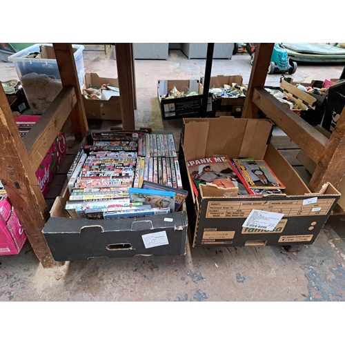 819 - Four boxes containing adult DVDs and magazines