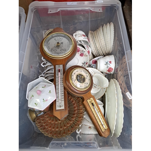 829 - Three boxes and three wicker baskets containing house clearance items to include two models of Mow C... 