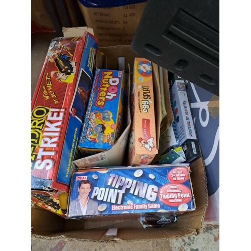 831 - Six boxes containing a large collection of toys and games