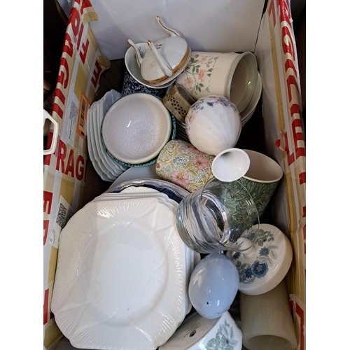 844A - Seven boxes containing books, Royal Doulton Cascade dinnerware, curtains, boxed Camping Gaz portable... 