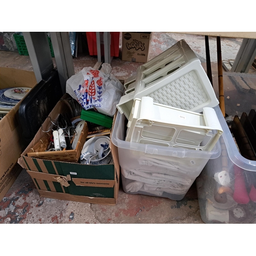 850 - Five boxes containing oak and rattan magazine rack, bamboo bread bin, cutlery etc.