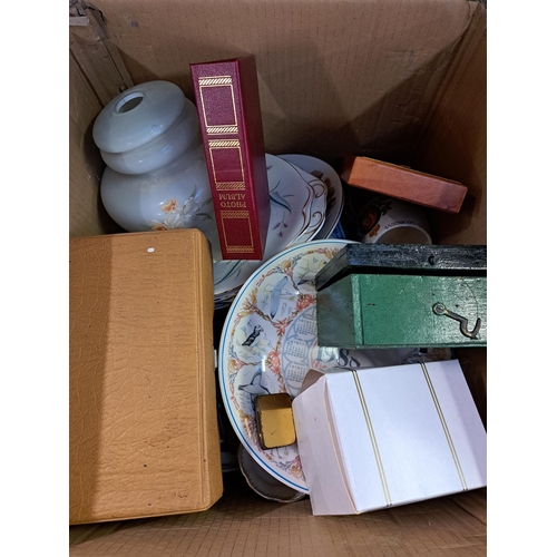 864A - Seven boxes containing ceramics, collectors cards, Oriental ceramic vase, glassware etc.