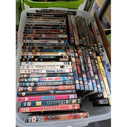 871 - Three boxes containing a large collection of DVDs