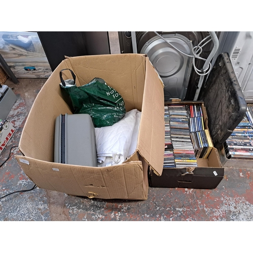 874 - Two boxes containing CDs, cassettes, Samsonite carry case etc.