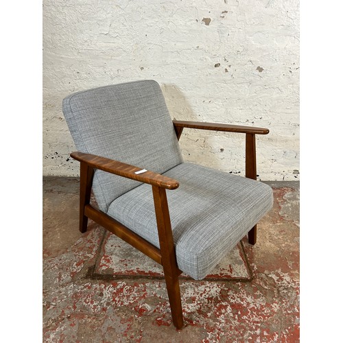 135A - An IKEA Ekenaset stained beech and grey fabric upholstered armchair