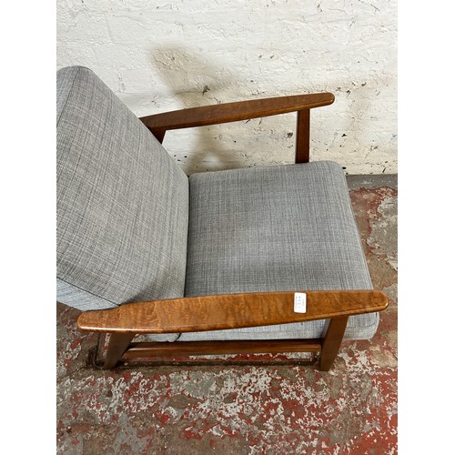 135A - An IKEA Ekenaset stained beech and grey fabric upholstered armchair