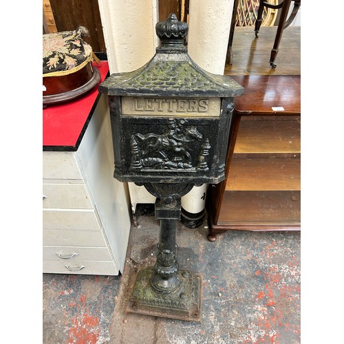 210 - A Victorian style cast iron letter box on pedestal base - approx. 116cm high