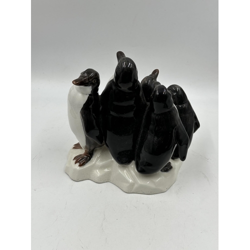 329 - A Gama of Valencia porcelain penguin group figurine - approx. 18cm high