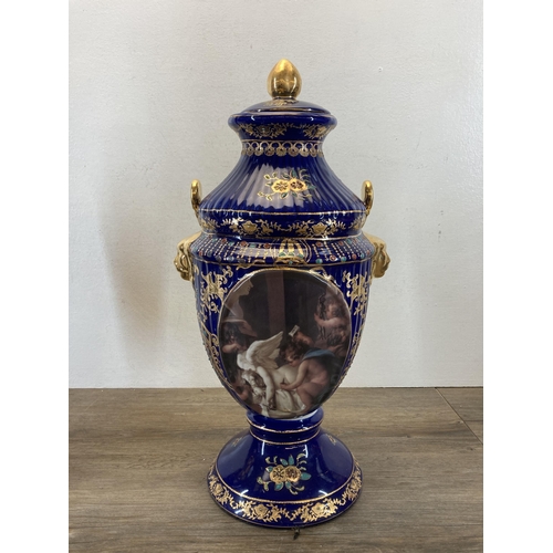 344 - A pair of Victorian style cobalt blue and gilded transfer printed twin handled jars and covers - app... 