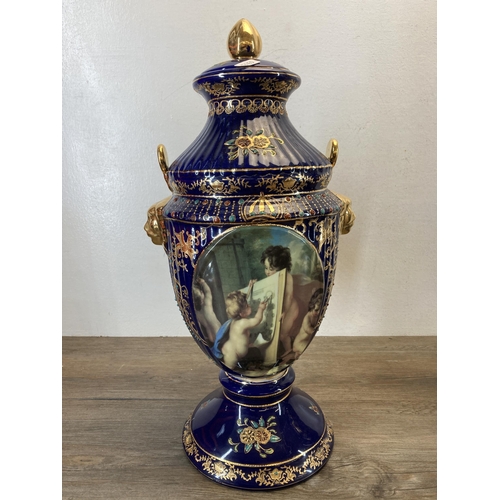 344 - A pair of Victorian style cobalt blue and gilded transfer printed twin handled jars and covers - app... 